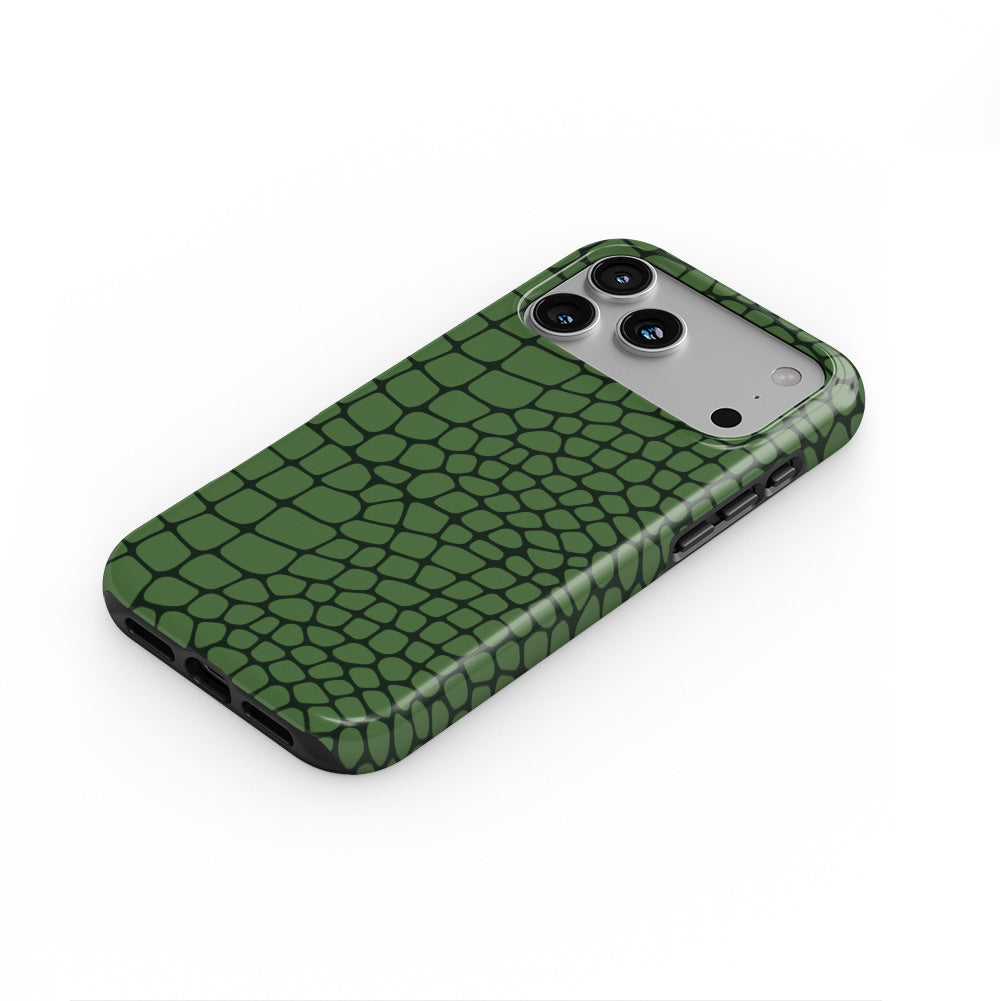 Green Snake phone case lying flat at an angle, showing the raised edge profile