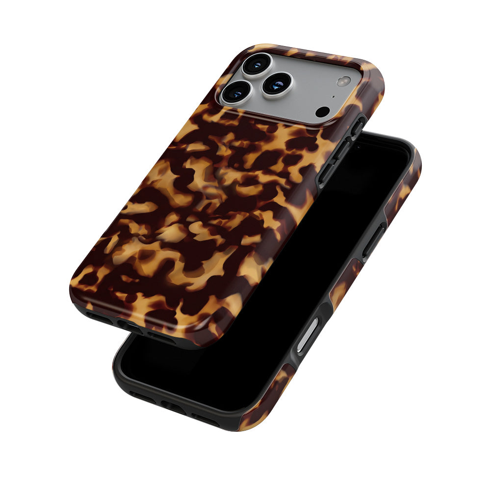 Classic Tortoiseshell phone case stacked behind a phone, showing print and device together