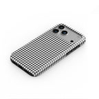 Black in White Houndstooth phone case — steep top-down angle, case lying face up