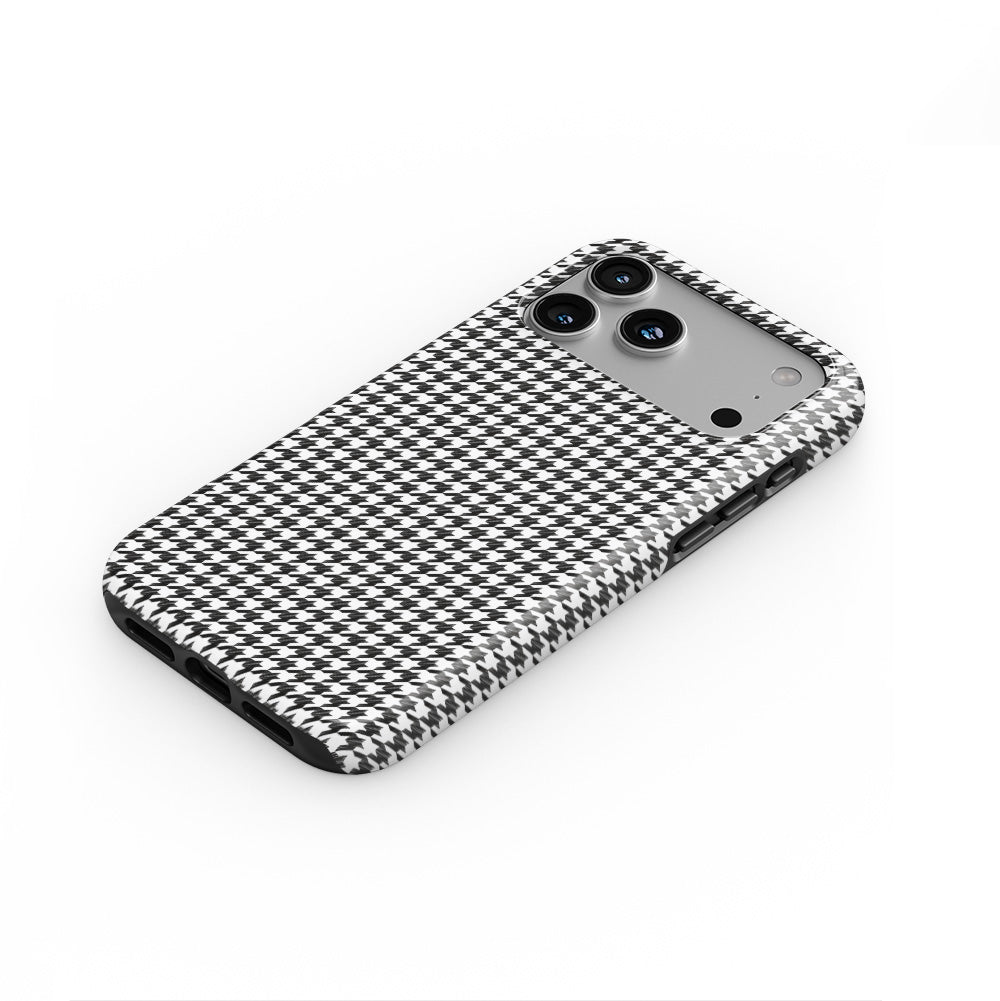 Black in White Houndstooth phone case — steep top-down angle, case lying face up