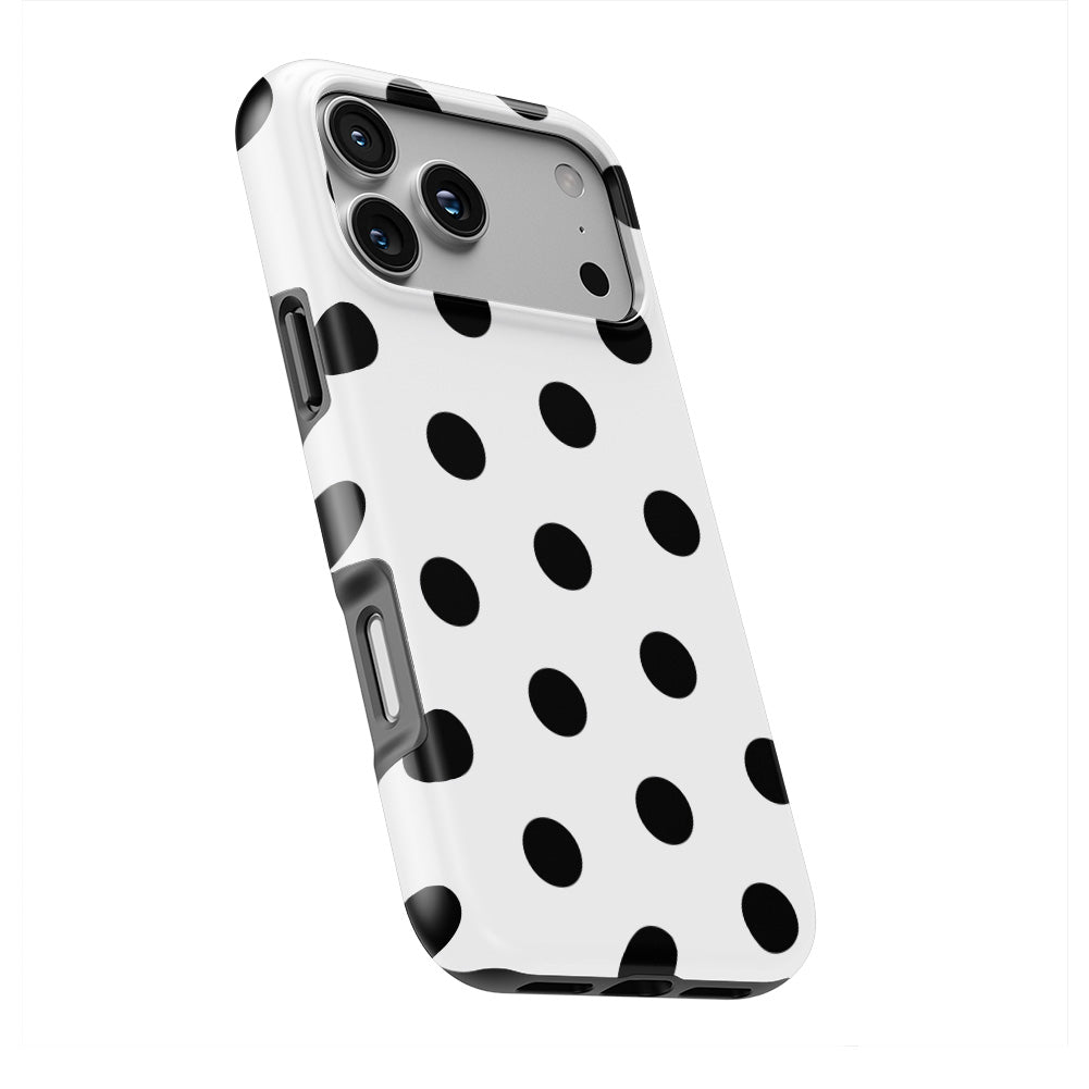 Black in White Polka Dots phone case — slight angle, side edge visible