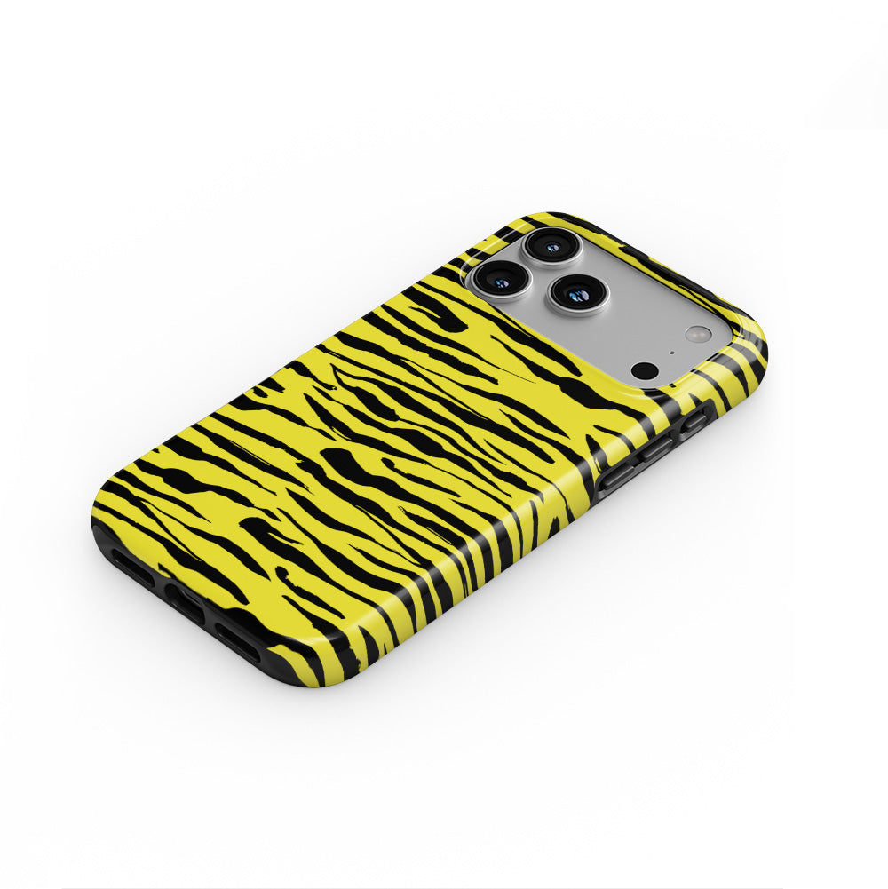 Black in Yellow Tiger phone case — steep top-down angle, case lying face up