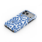 Blue Abstract Starburst phone case — steep top-down angle, case lying face up