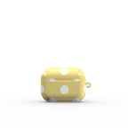White in Butter Yellow Polka Dots Apple AirPods Tough Case — angled view