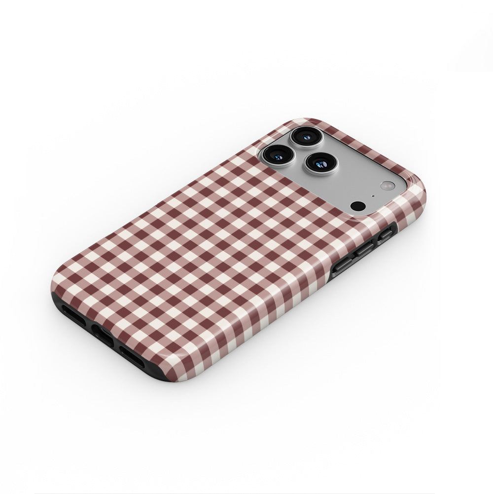 Cherry Mocha Gingham phone case — steep top-down angle, case lying face up