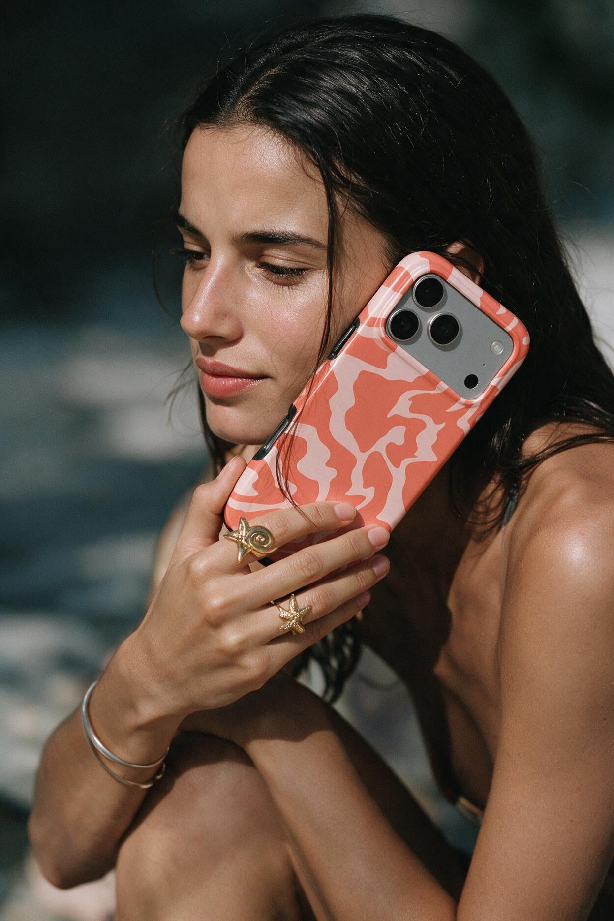 Orange Abstract Wave phone case, in use