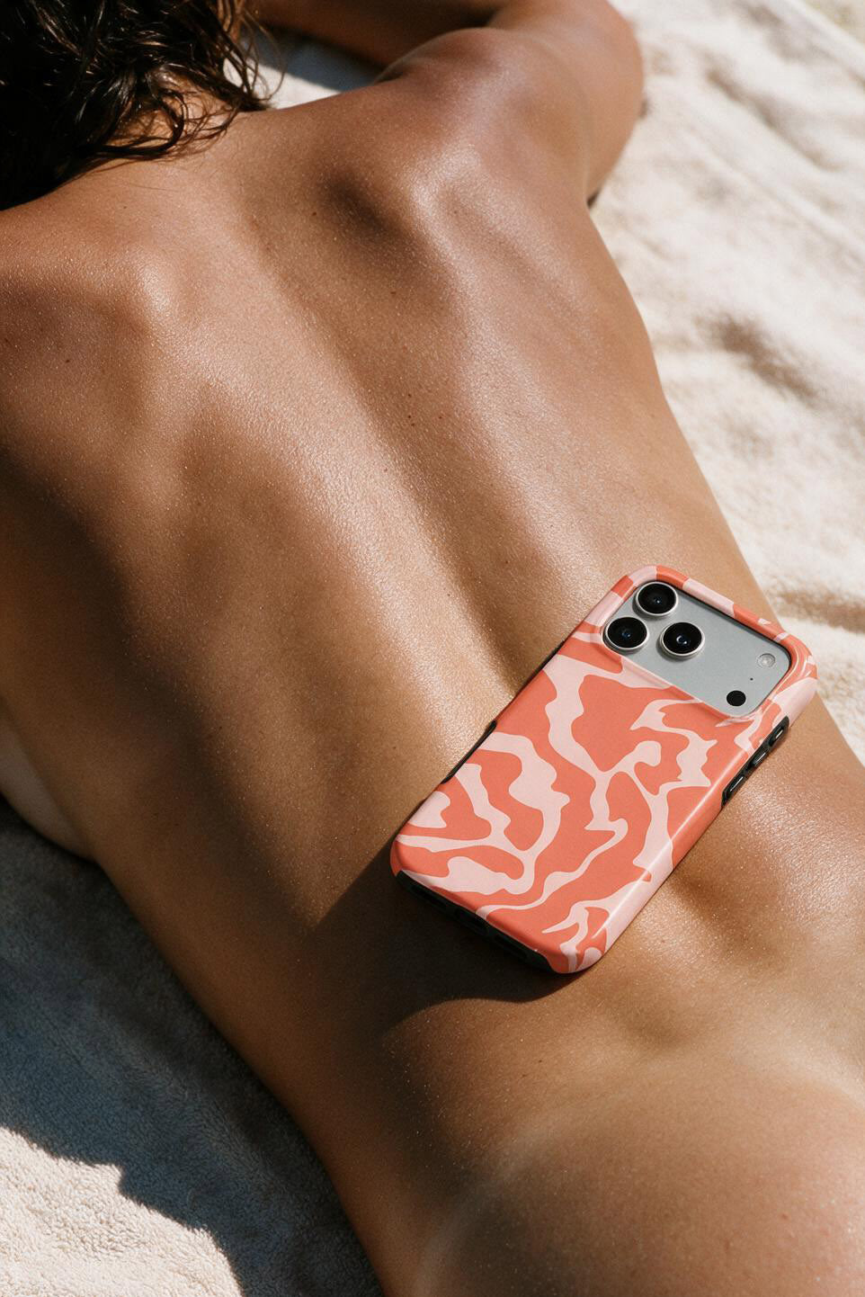 Orange Abstract Wave phone case, in use
