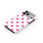 Pink in White Polka Dots phone case — steep top-down angle, case lying face up