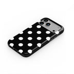 White in Black Polka Dots phone case — steep top-down angle, case lying face up