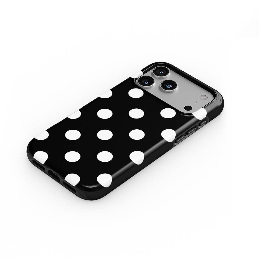 White in Black Polka Dots phone case — steep top-down angle, case lying face up